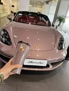 Aesthetic hot pink luxury sports car wallpaper for mobile screen.