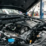 Inspecting the engine bay and timing chain of a Chevrolet Captiva diesel.